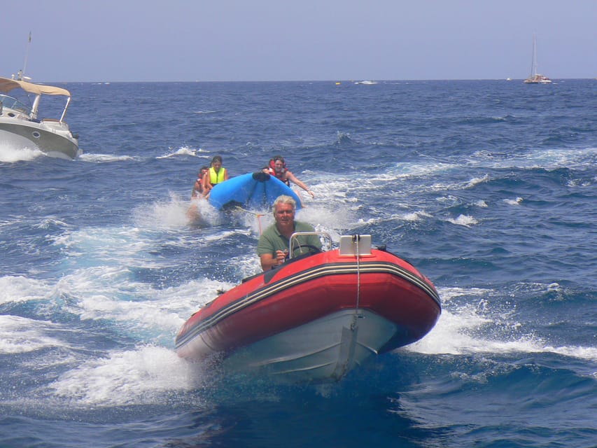 From Puerto Rico: Boat trip along the coast w/ Food & Drinks - Lunch, drinks, and the two package choices