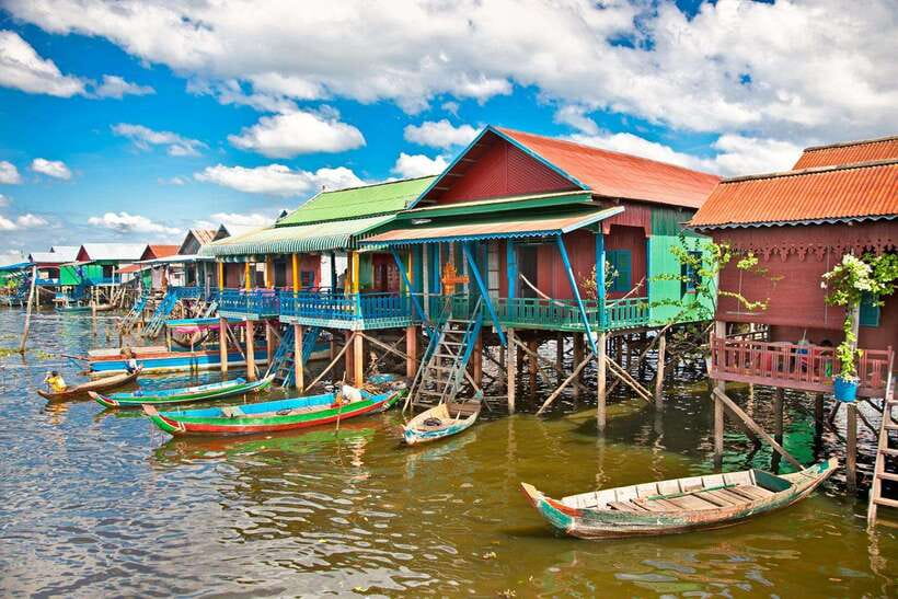 From Siem Reap: Kampong Phluk Floating Village Tour by Boat - Walking through the stilted village