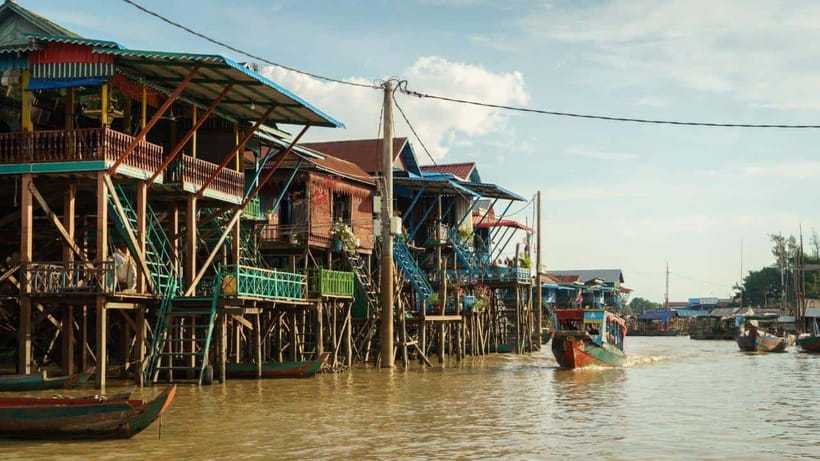 From Siem Reap: Kampong Phluk Floating Village Tour by Boat - The flooded mangroves by small canoe