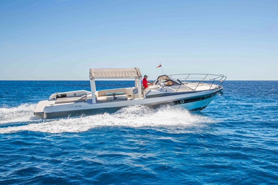 From Split: Blue Cave & 5 Islands with Vis & Hvar Boat Tour - Komiža, a fishing village with film connections