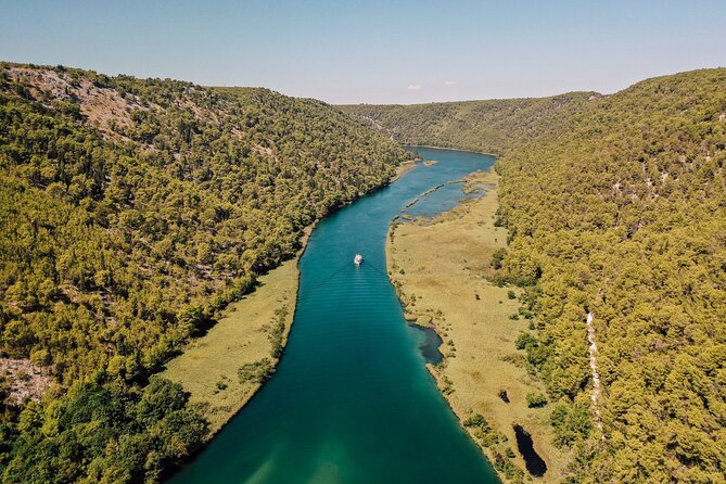 From Split: Krka Waterfalls Tour, Boat Cruise & Swimming - What the guides add to a large-group day