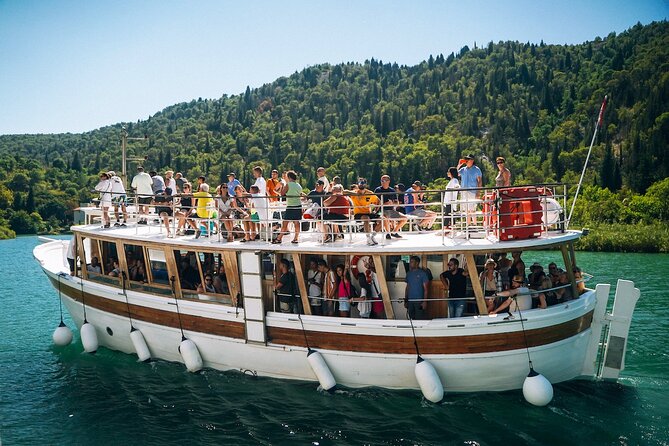 From Split: Krka Waterfalls Tour, Boat Cruise & Swimming - The boat cruise between the park and Skradin