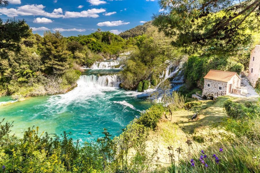 From Split & Trogir: Krka Waterfalls Day Tour with Boat Ride - The boat from the park to Skradin