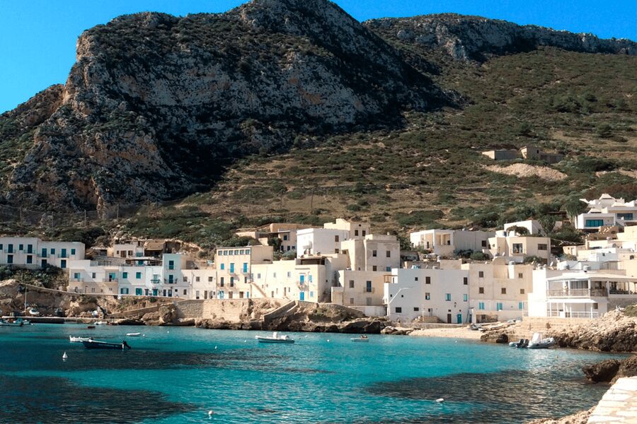 From Trapani: Favignana and Levanzo Egadi Island Day Cruise - Cala Rossa and Scalo Cavallo show different sides of Favignana