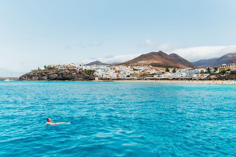 Fuerteventura: Glass Bottom Boat Cruise with Lunch & Drinks - The swimming stop and boat slide
