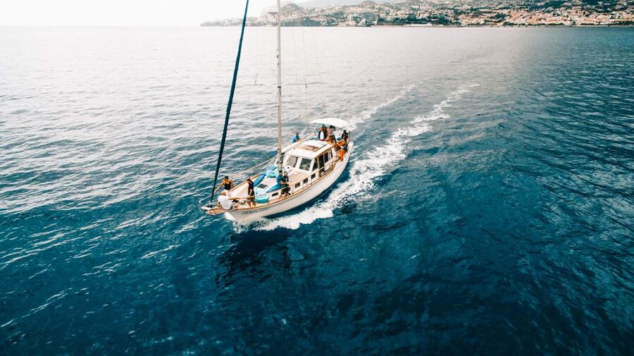 Funchal: Sunset Sailing Tour - The crew makes the small boat work