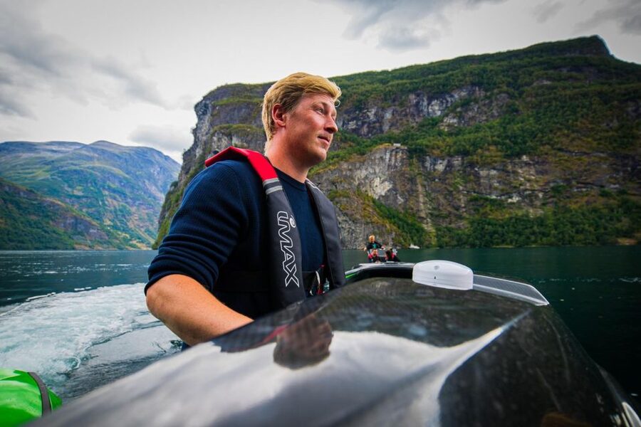 Geiranger: Guided Geirangerfjord Boat Tour - Friaren and the stories behind the cliffs