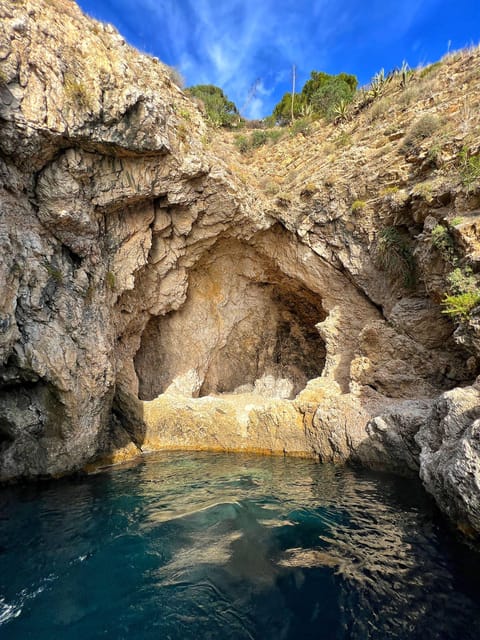 Giardini Naxos: Taormina & Isola Cruise Bella with Aperitif - Dolphins, music, and the mood on board