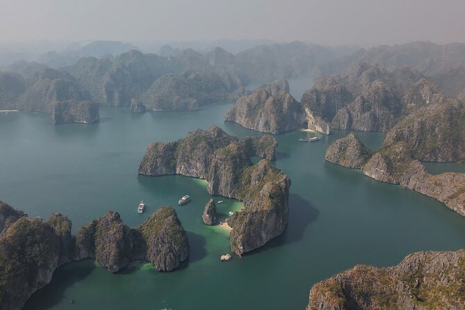Ha Long Bay Cruise Day Tour - Cave, Kayaking, Swimming & Lunch - Walking through Sung Sot Cave
