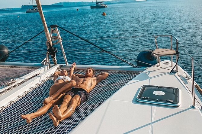 Half-Day Exclusive Catamaran Cruise in Santorini with Meal and Open Bar - Why seeing Santorini from a catamaran matters