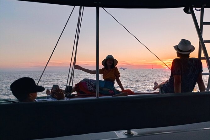 Half-Day Exclusive Catamaran Cruise in Santorini with Meal and Open Bar - Thirassia, snorkeling, and lunch on board
