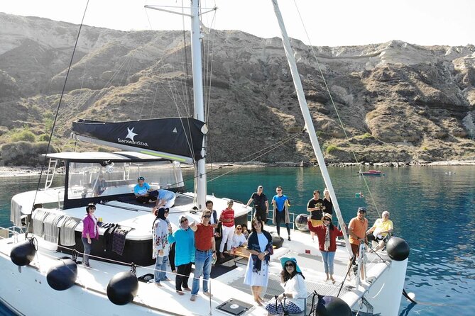 Half-Day Exclusive Catamaran Cruise in Santorini with Meal and Open Bar - Is the sunset cruise worth choosing?