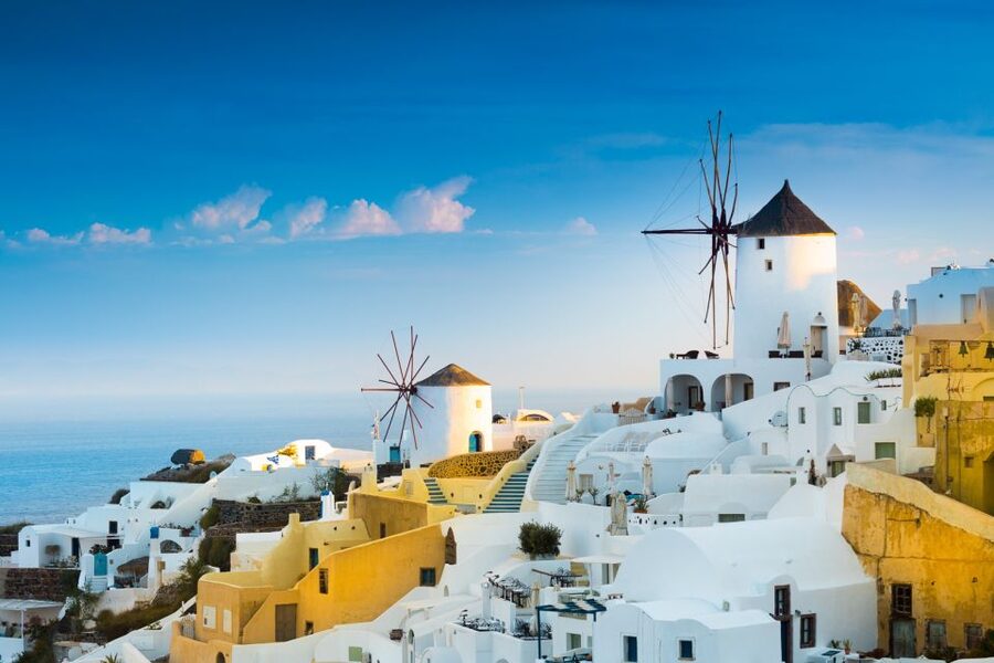 Heraklion: Santorini Day Trip with Boat Transfer & Oia Visit - What the guide adds