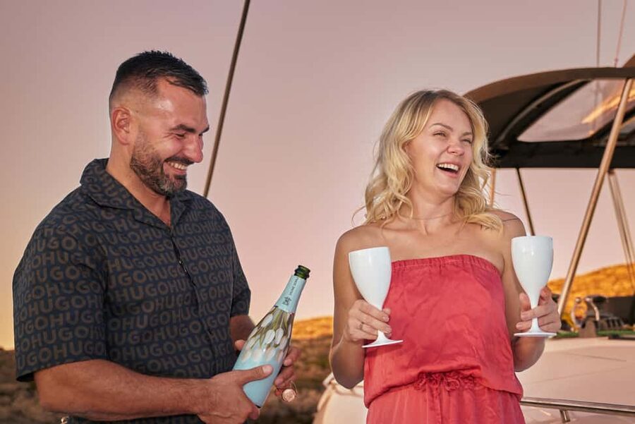 Hersonissos: Luxury Sunset Catamaran Cruise Sushi & Open Bar - Leaving Hersonissos with Prosecco and sushi