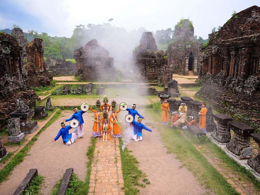 Hoi An: My Son Sanctuary, Rice Paper, Boat Trip & Lunch - Walking through the temple towers