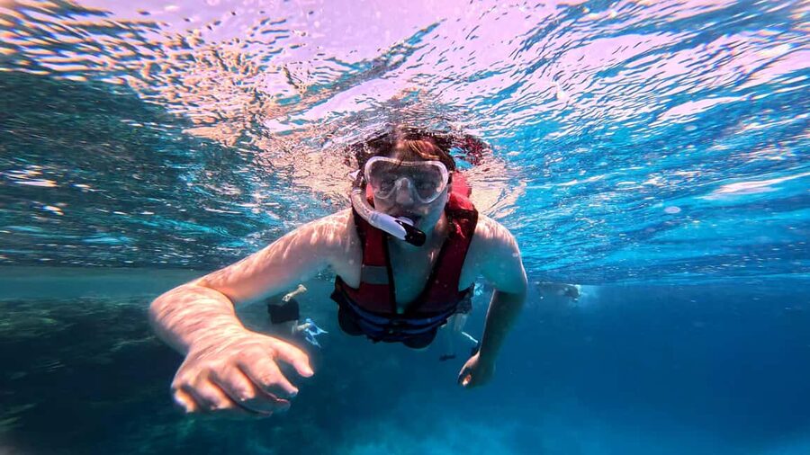 Hurghada: Dolphin Watching Boat Tour with Snorkeling & Lunch - What the two snorkeling stops offer