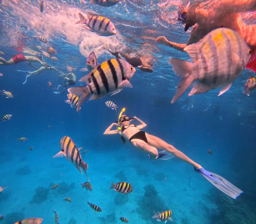Hurghada: Orange Bay Island Boat Trip w/ Breakfast and Lunch - Banana boats, sofa rides, and weather limits