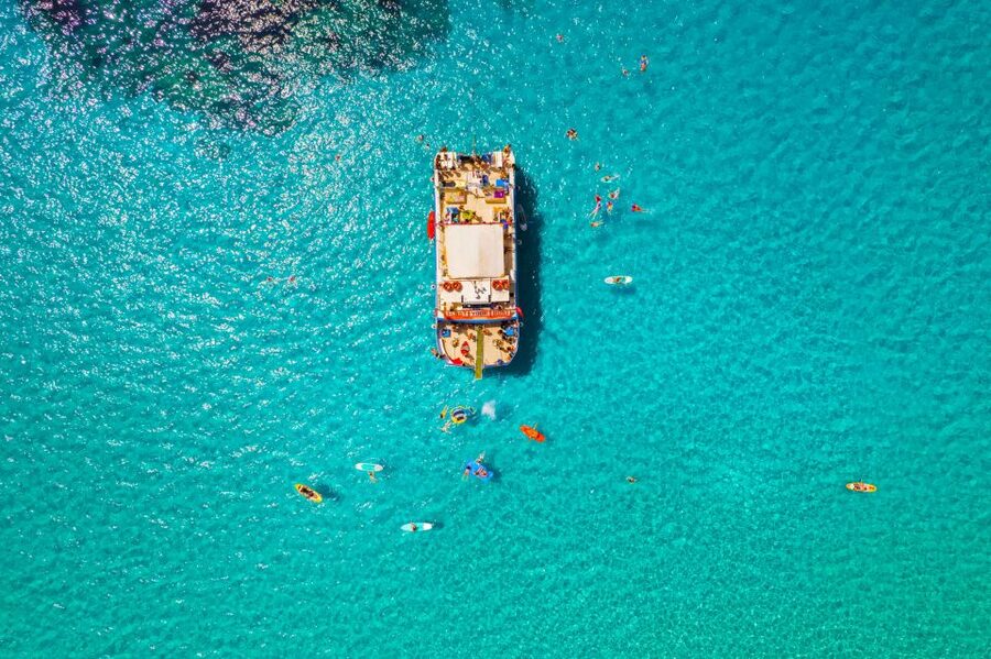 Ibiza: Beach Hopping Cruise w/ Paddleboard, Food, & Drinks - Cala Comte gives you the postcard finish