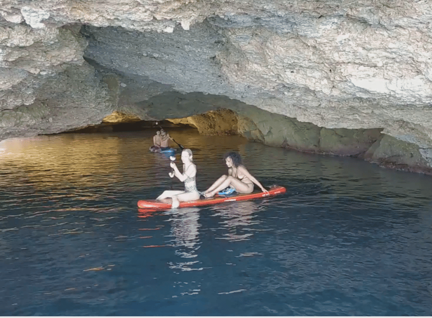 Ibiza: Snorkeling and SUP Paddle, Beach and Cave Boat Tour - Cala Comte: clear water and a good first swim