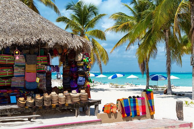 Isla Mujeres Catamaran Tour with Snorkel, Open bar and Transport - Reaching Playa Norte and downtown Isla Mujeres