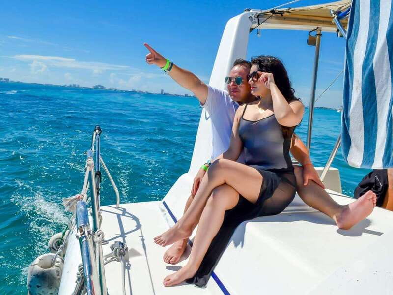 Isla Mujeres: Catamaran with Open Bar, Snorkeling and Lunch - Lunch, beach club service, and the package fine print