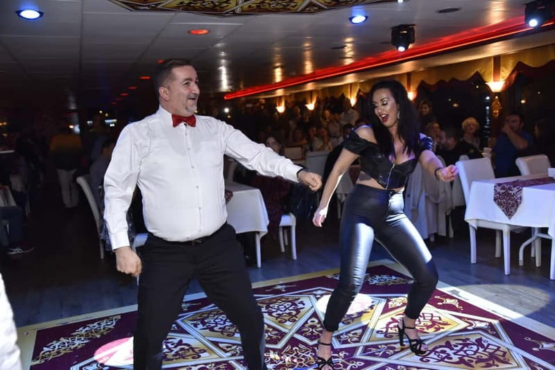 Istanbul: Bosphorus Dinner Cruise with Turkish Night Show - The first stretch: Dolmabahçe, Çırağan, and Ortaköy