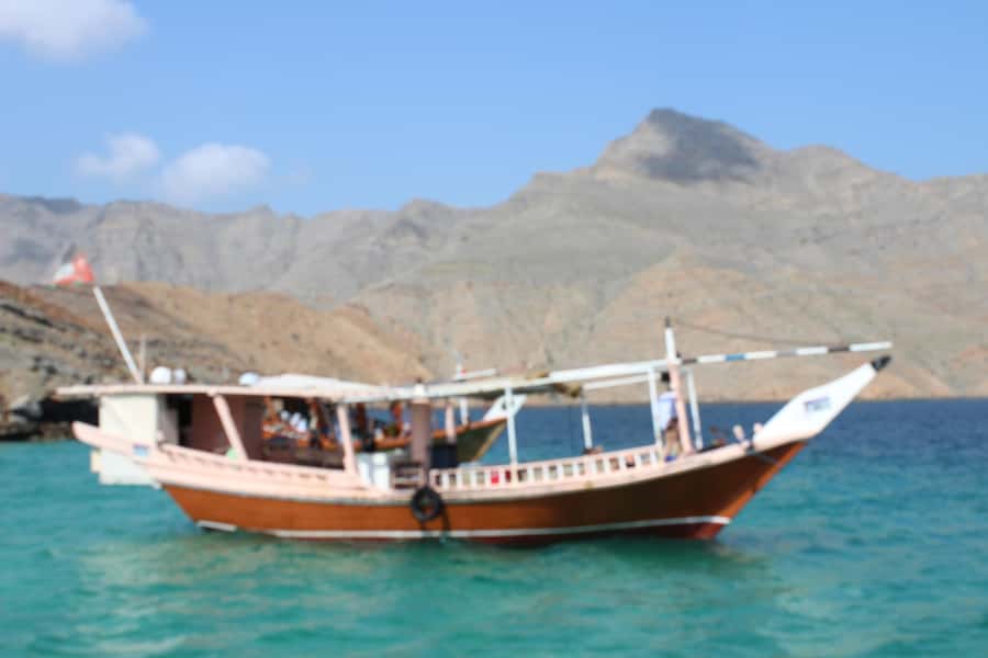 Khasab: Half-Day Dhow Cruise, Dolphin Watching, & Snorkeling - Pickup from Khasab hotels, airport, or cruise terminal