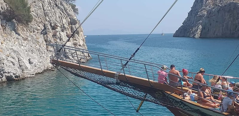 Kos: 3-Island Cruise with Lunch, Swimming and Audio Guide - Kalymnos: sponges, Vathy, and a useful island stop