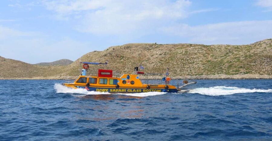 Kos Town: Glass-Bottom Boat Cruise with Swimming Stops - Finding the yellow Dorry at Kos port