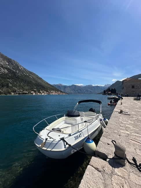 Kotor: Our Lady of the Rocks and Blue Cave Group Boat Tour - Entering the Blue Cave by boat