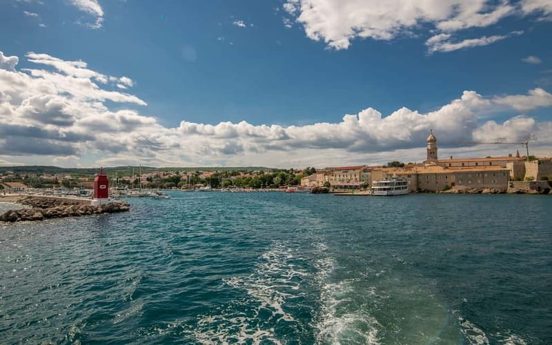 Krk: Golden Beach and Blue Cave Cruise with Welcome Drink - A short cruise with a big Adriatic payoff
