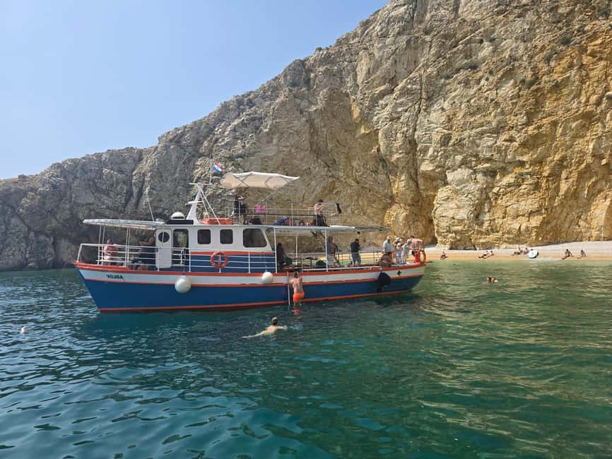 Krk: Golden Beach and Blue Cave Cruise with Welcome Drink - Kormat Island and the seagull show