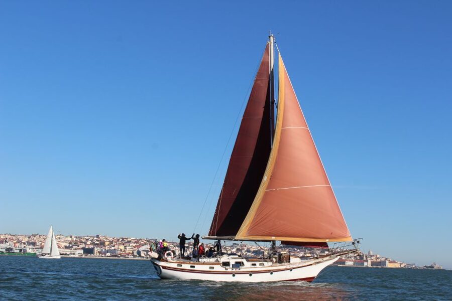Lisbon: Daylight or Sunset on a Vintage Sailboat - Boarding beneath the 25 de Abril Bridge