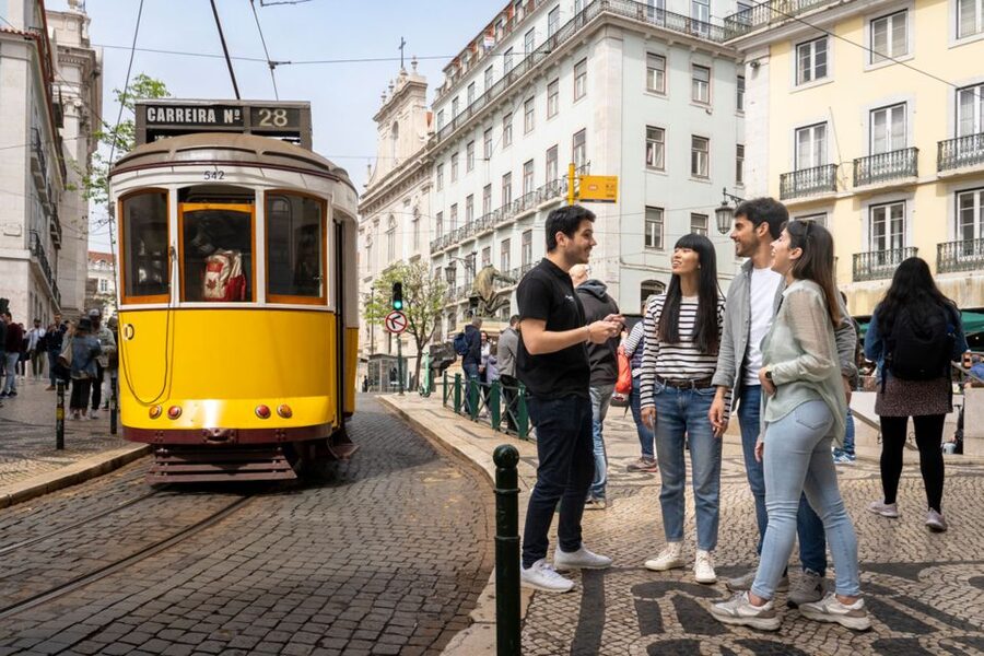 Lisbon: Helicopter Ride, Boat Trip, & Old Town Walking Tour - Transport, group rhythm, and guide quality
