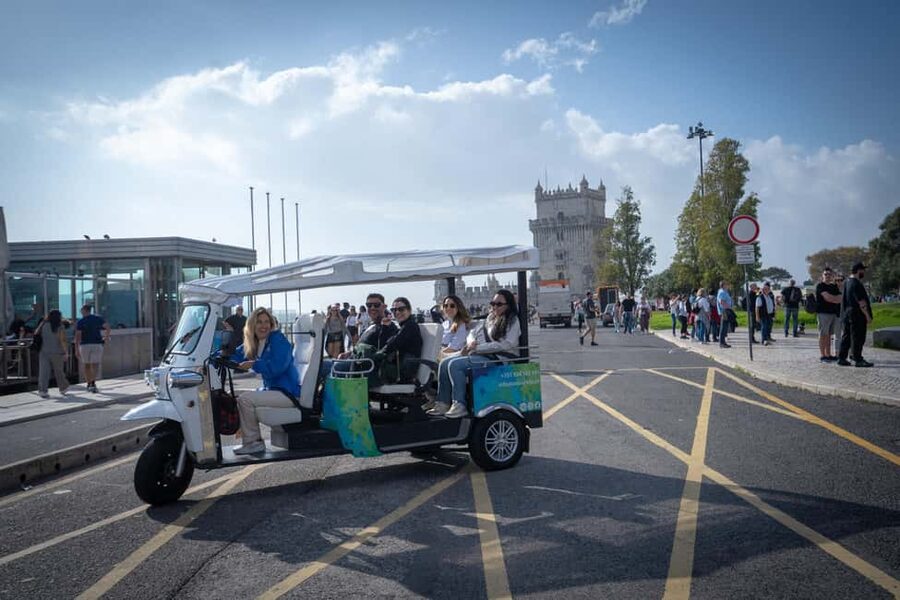 Lisbon: Private Tuk Tuk Tour with Optional Boat Cruise - The Premium day reaches the coast and returns by boat
