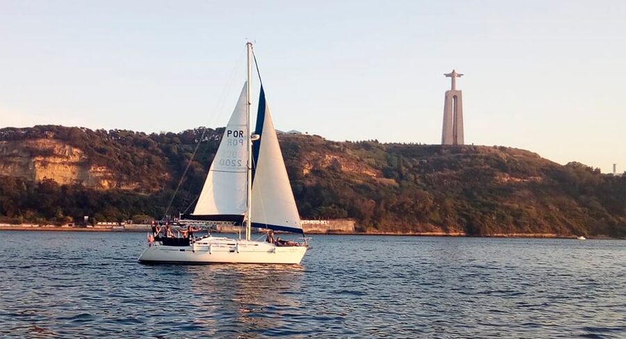 Lisbon: Sailing Tour with Wine and Snacks - Taking the helm, or simply sitting at the bow