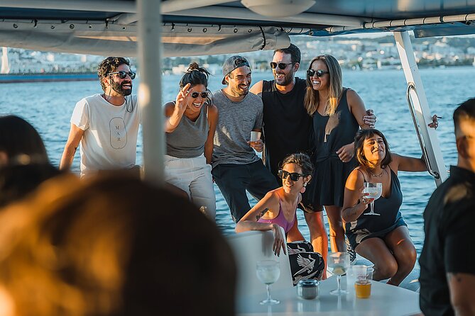 Lisbon: Sunset Catamaran Boat Tour with Music and Drinks - Finding Doca de Santo Amaro