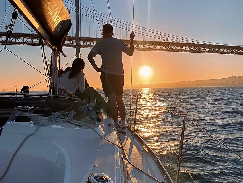 Lisbon: Sunset Cruise with Drinks - Passing beneath the 25 de Abril Bridge