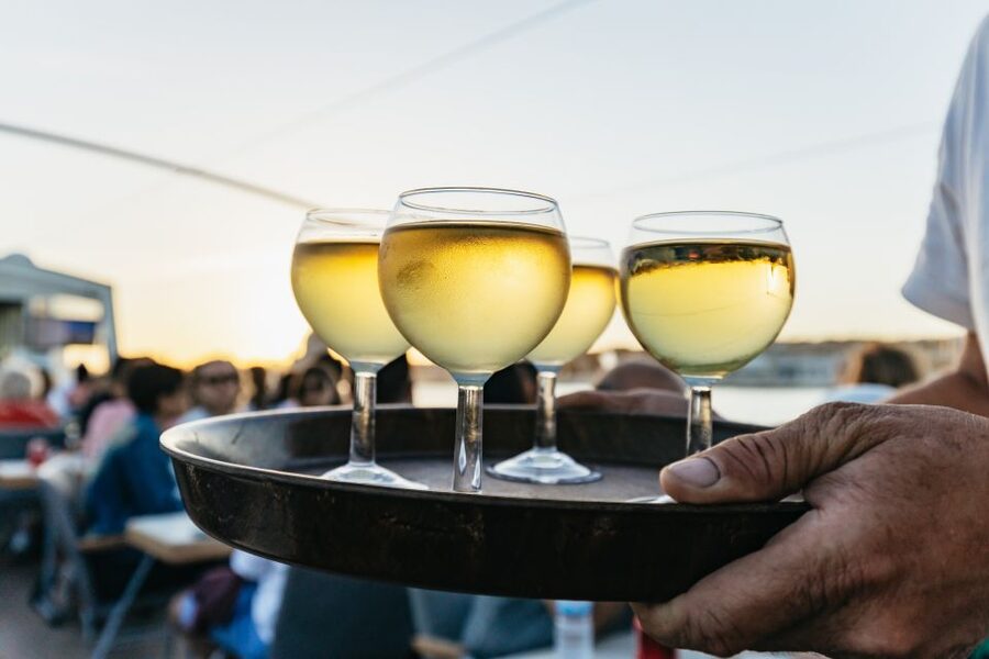 Lisbon: Sunset Cruise with Welcome Drink and Snacks - Returning past Christ the King