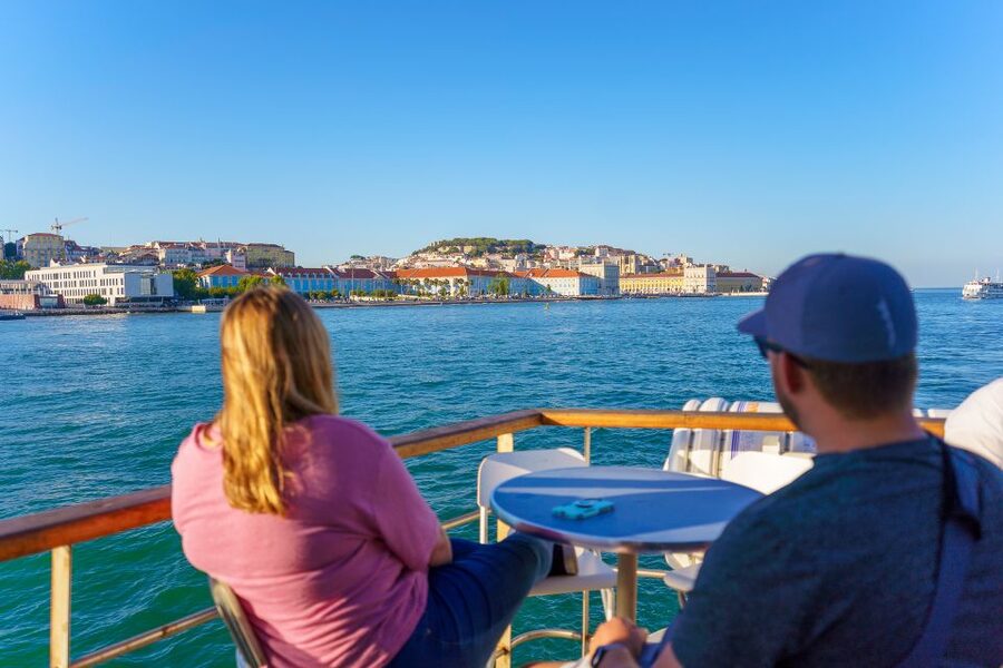 Lisbon: Tagus River Cruise with Welcome Drink - Passing under the 25th of April Bridge