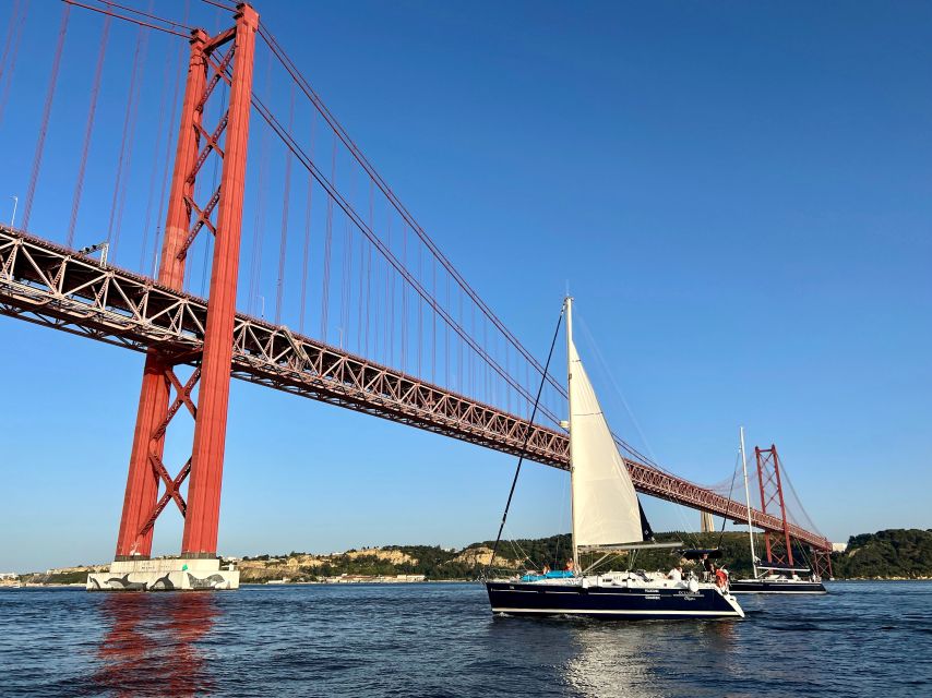 Lisbon: Tagus River Sunset Cruise with Drinks - Cacilhas and Christ the King across the river