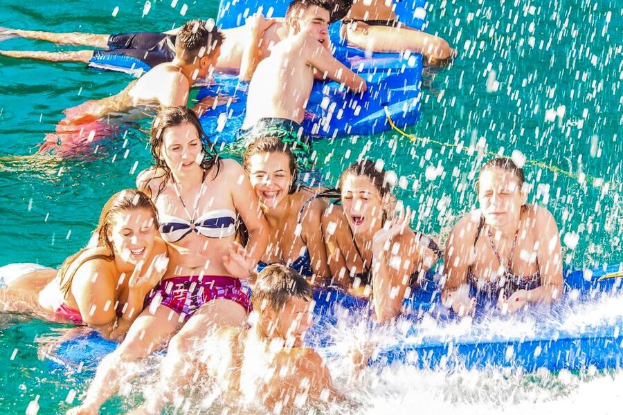 Lloret de Mar: Catamaran Sailing Cruise with BBQ and Drinks - The return becomes a floating party