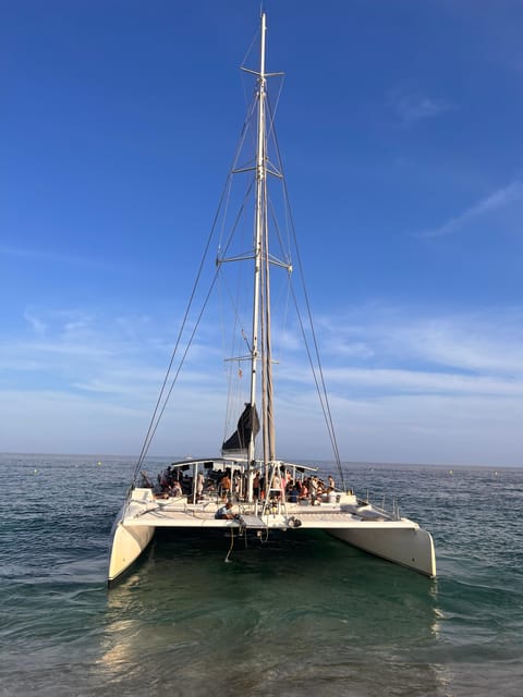 Lloret de Mar: Sunset Catamaran Cruise with DJ and Drinks - The drinks and DJ set