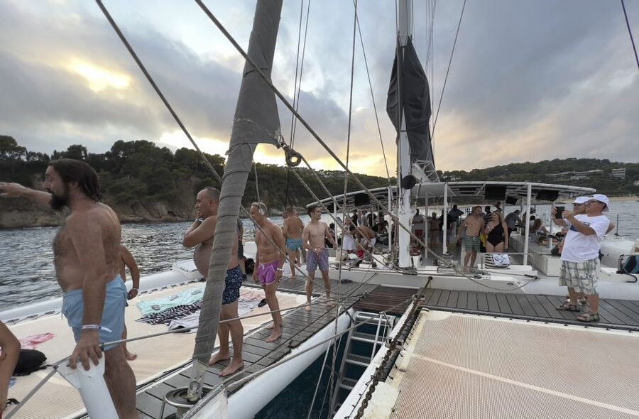 Lloret de Mar: Sunset Catamaran Cruise with DJ and Drinks - Sunset views from the water