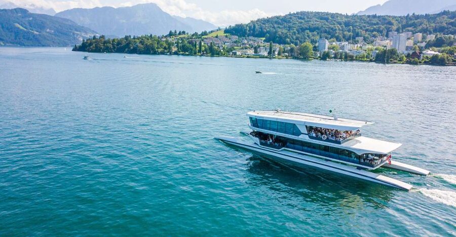 Lucerne: Round-Trip Catamaran Cruise on Lake Lucerne - Leaving KKL Lucerne for the open water