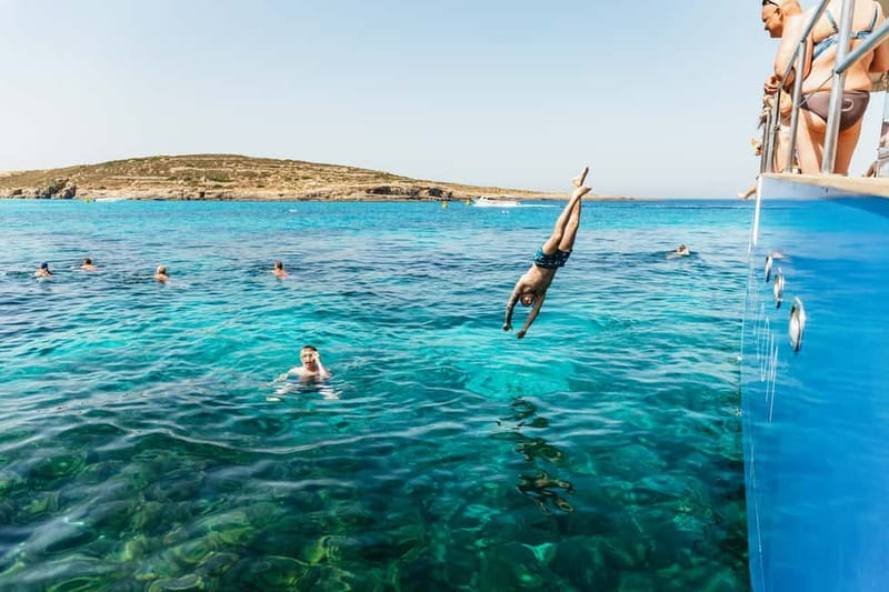 Malta: Blue Lagoon, Beaches & Bays Trip by Catamaran - Crystal Lagoon and the caves around Comino