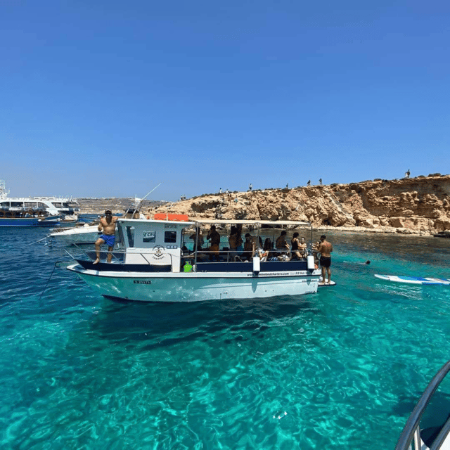 Malta: Blue Lagoon, Crystal Lagoon & Sea Caves Boat Tour - Blue Lagoon is beautiful, busy, and now more regulated