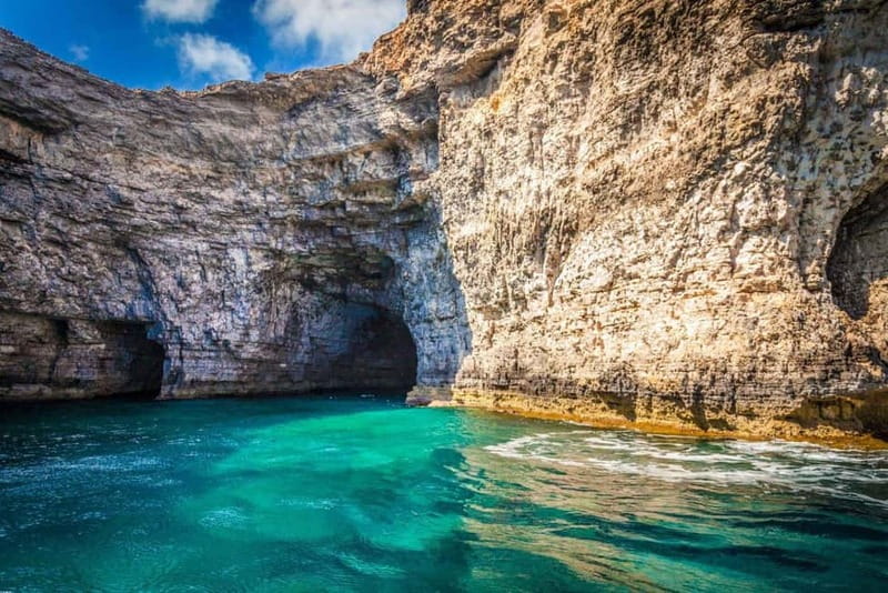 Malta: Comino, Gozo, Blue & Crystal Lagoon, and Caves Cruise - Cruising past Elephant Rock and Comino’s caves