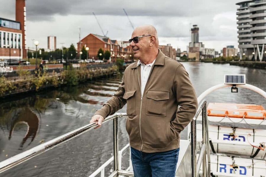 Manchester: Canal & River Cruise - Starting under the blue and white Millennium Lift Bridge
