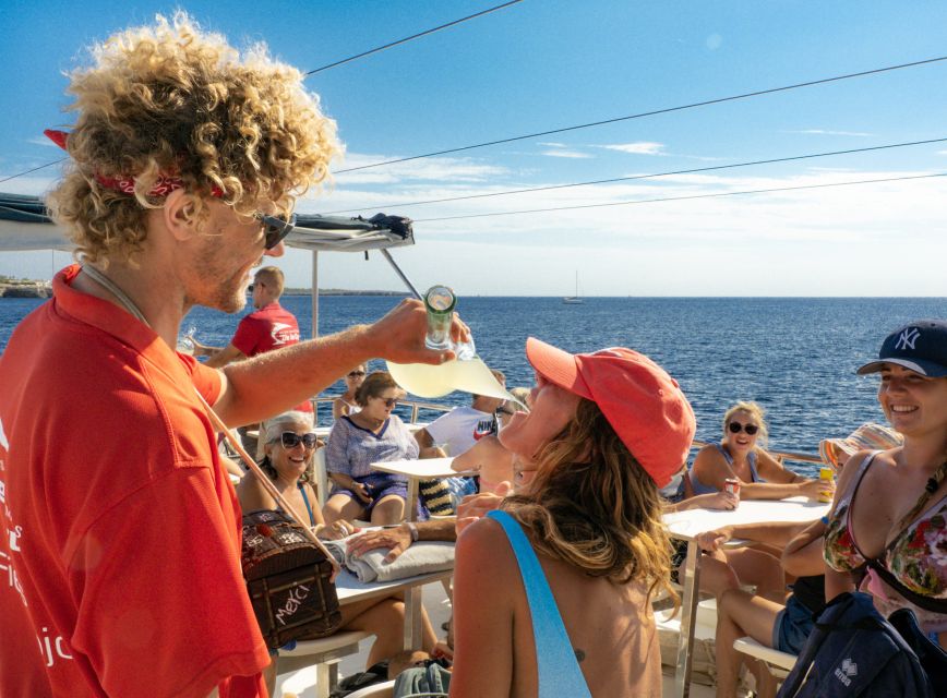 Menorca: Full-Day Boat Tour with Paella Lunch - Son Saura is the more relaxed second swim